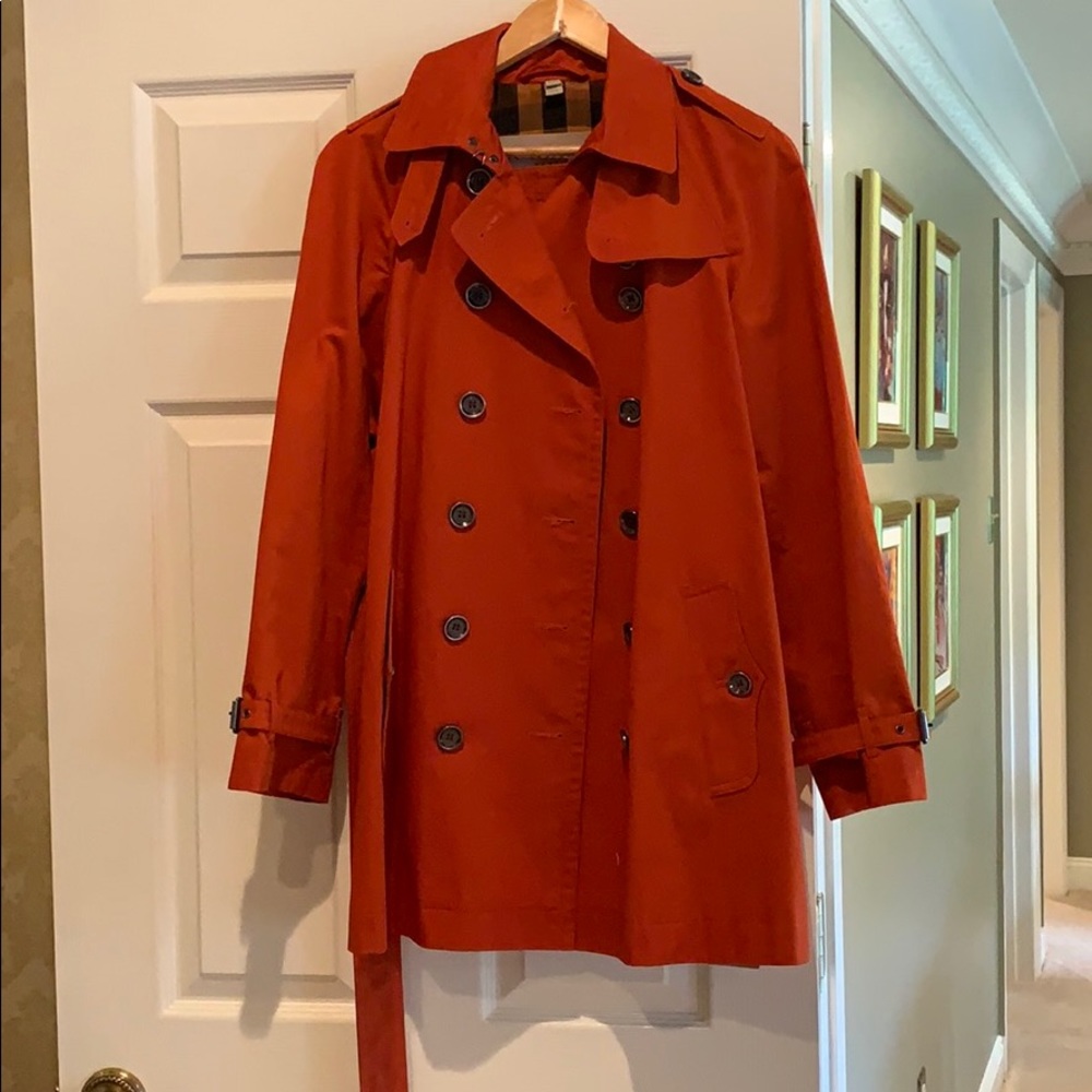 Burberry burnt orange rain coat
